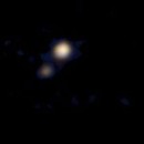 A primeira imagem em cores de Plutão e sua lua
